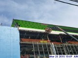 Installing sheathing around the parapet (South Elevation).jpg